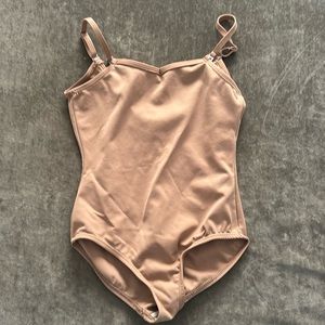 Capezio nude leotard. Adjustable straps. Full bottom. Color- dark nude. Size- LC